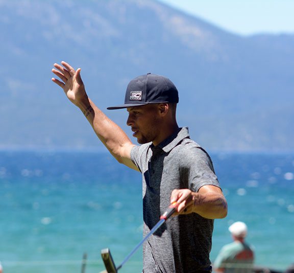 Steph Curry reacts after sinking a putt for par at last year’s American Century Championship. Photo by Tim Parson, Tahoe Onstage