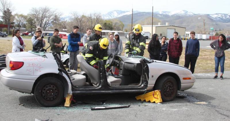 CTE health sciences students work with Carson Fire Department for EMT skills training.