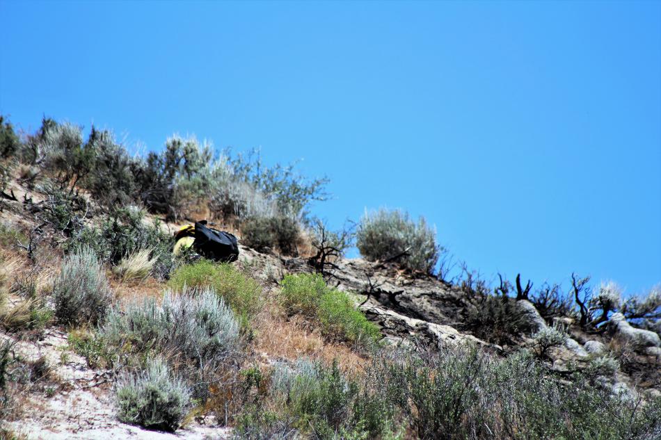 Firefighters at a ridge line attack the hot spots. Photo By Brett Fisher
