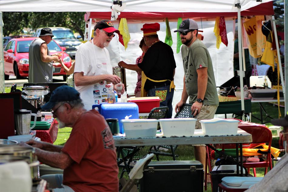 Chili cooks wait to share their fare with guests Saturday at Glen Eagles.