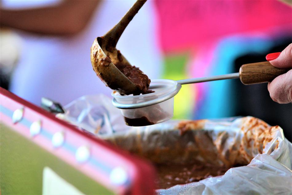 Chili is ladeled into a tasting cup Saturday at Glen Eagles.