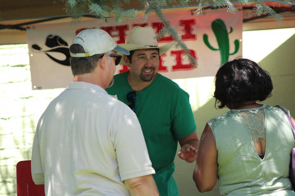Chili the Kid talks with guests Saturday during the chili cook off at Glen Eagles.