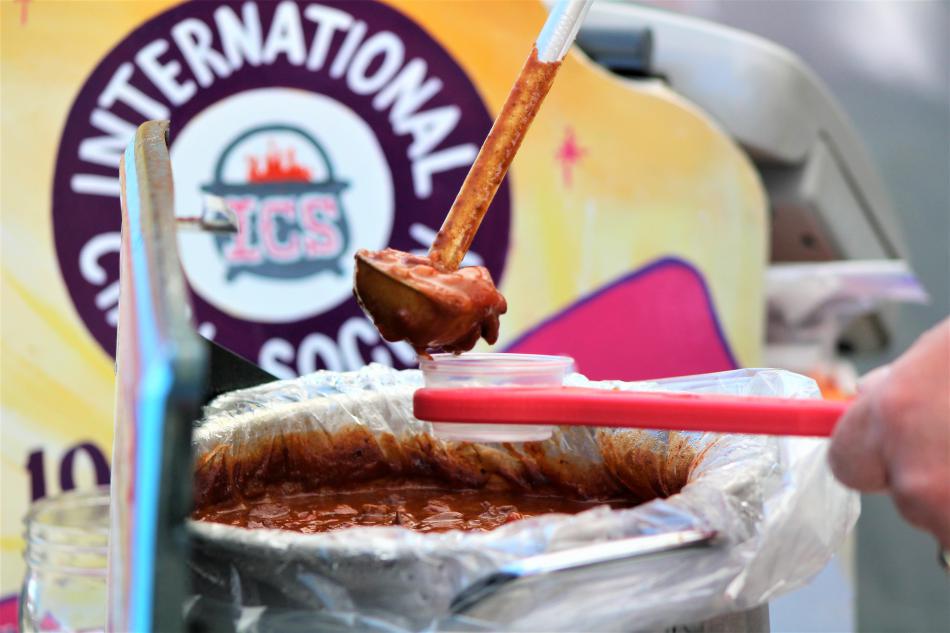 Chili is ladeled into a serving cup Saturday at the ICS sanctioned competition.