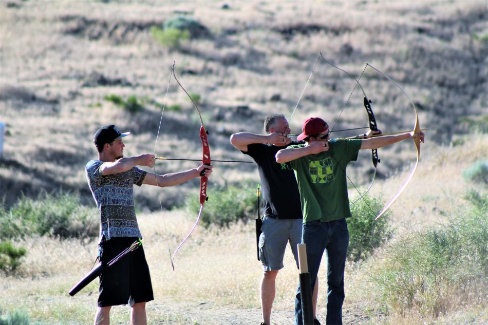 Recurve bow shooters.