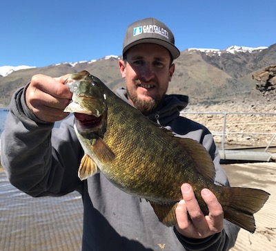 Tye Tittle with a nice small mouth bass caught at Topaz Lake.