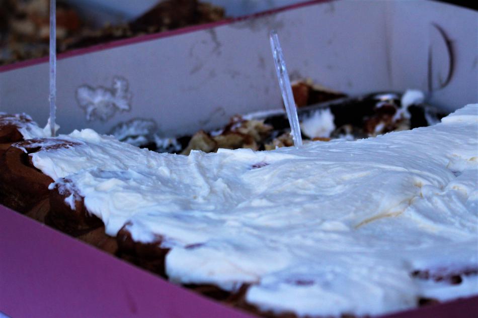 Heavily frosted giant cinnamon rolls.