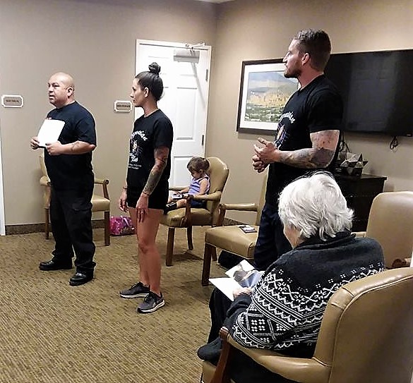 Photo courtesy Tazmanian Boxing Club. Cisco Rodriguez (left) and his trainers give a presentation to seniors.