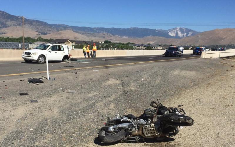 A male motorcycle died Friday morning after striking rear of SUV. Photo by Nevada Highway Patrol