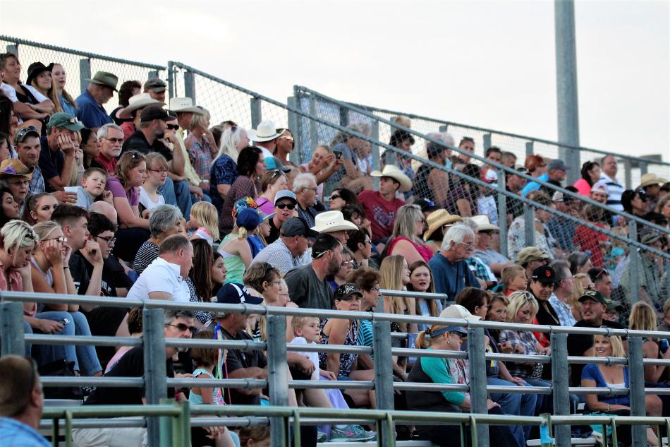 Crowds in the rodeo arena stands Friday evening.
