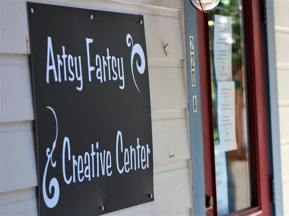 The cozy cottage at Telegraph Square is now home to the Artsy Fartsy Creative Center.