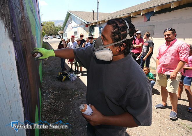Mural artist Abner Rivera demonstrates for a group of Boys & Girls Club members. Cathleen Allison, Nevada Photo Source