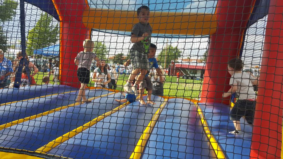 Having fun in the Bounce House. Photo by Isaiah Burrows