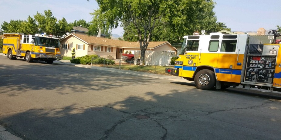 Firefighters knocked down a small fire behind a Baker Street residence. Photo by Isaiah Burrows; second photo frame by CCFD.