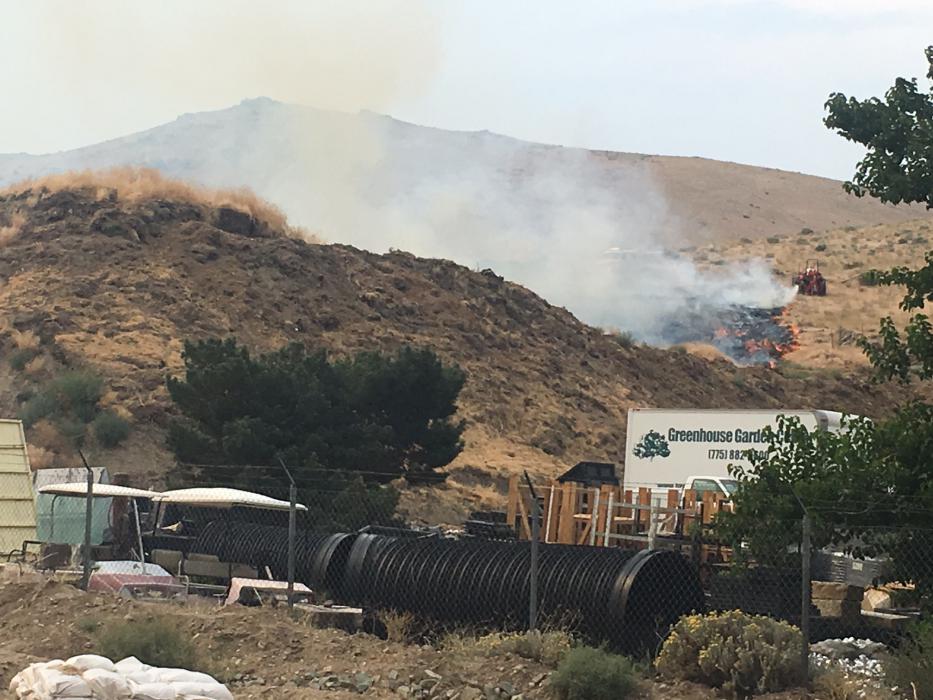 The fire is behind Greenhouse Garden Center. Photos by Kirk Caraway