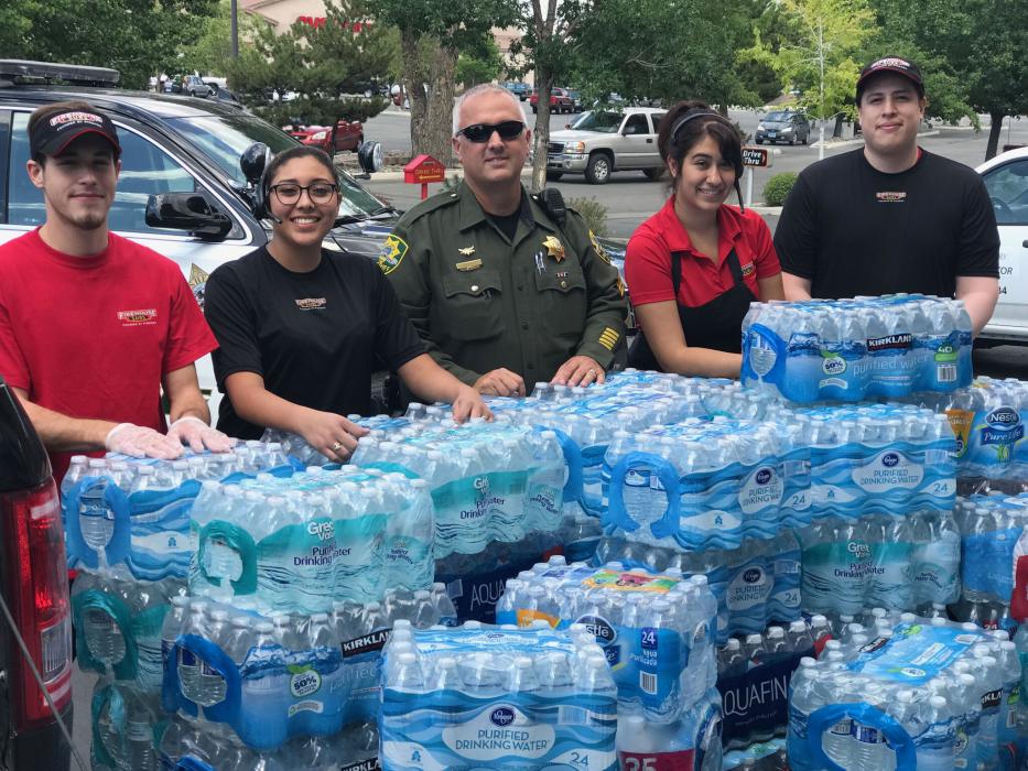 Carson City first responders receive 80 cases of water from Firehouse Sub patrons.