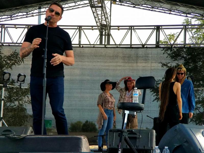 Photos by Brett Fisher. Ty Herndon does a sound check with Rednex in the background.