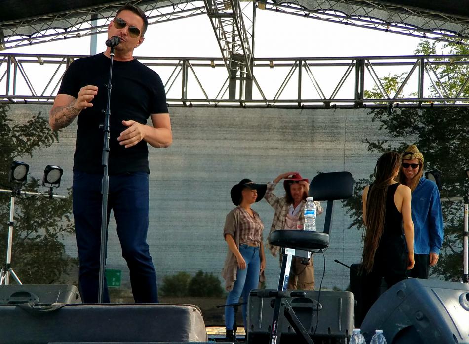Photos by Brett Fisher. Ty Herndon does a sound check with Rednex in the background.