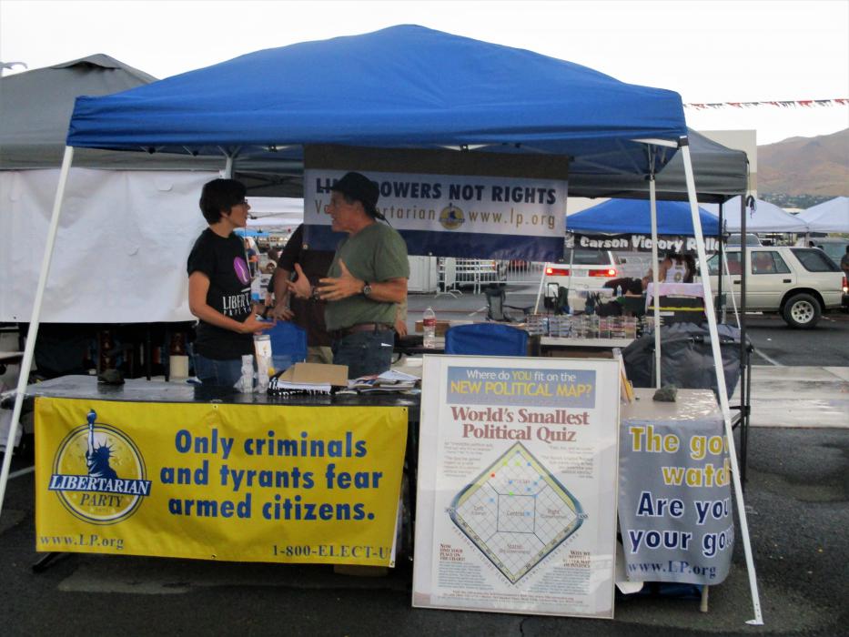 Photo by Isaiah Burrows. Vendor booth at Battle Born Harley Davidson Saturday.