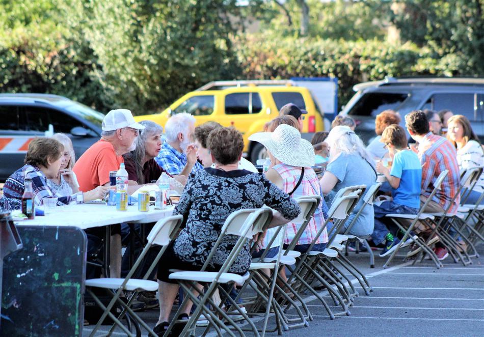 The community dinner table at the BAC has seating for a few dozen diners.
