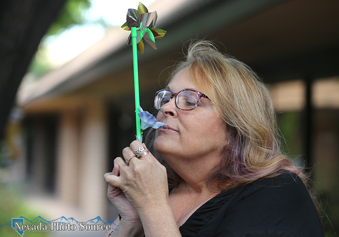 Ron Wood Family Center social worker Lisa Yesitis demonstrates a breathing technique. Cathleen Allison, Nevada Photo Source