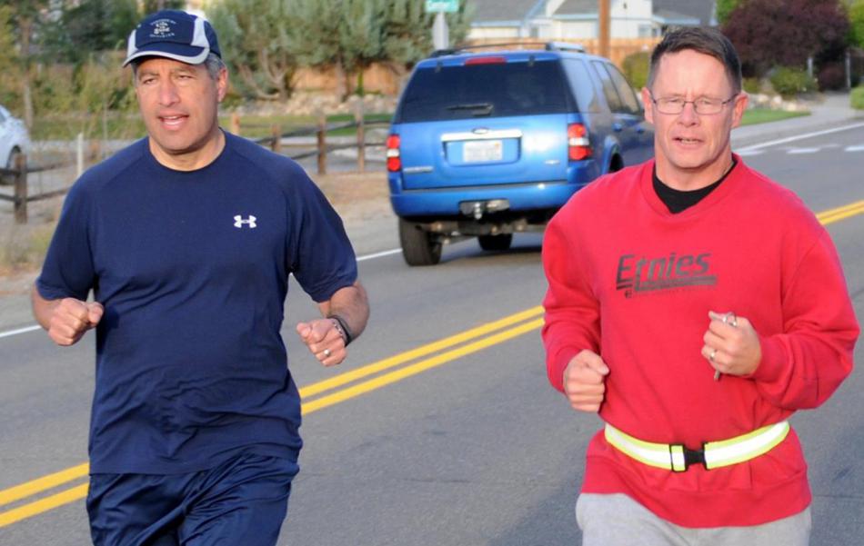 Gov. Brian Sandoval, left, and Brig. Gen. Michael Hanifan participate in the 2015 Memorial Run in Carson City.