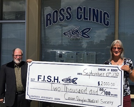 Ross Clinic Volunteer Robert Chudnow, MD and Carson Douglas Medical Society Alliance Representative Amy Hayes, MD