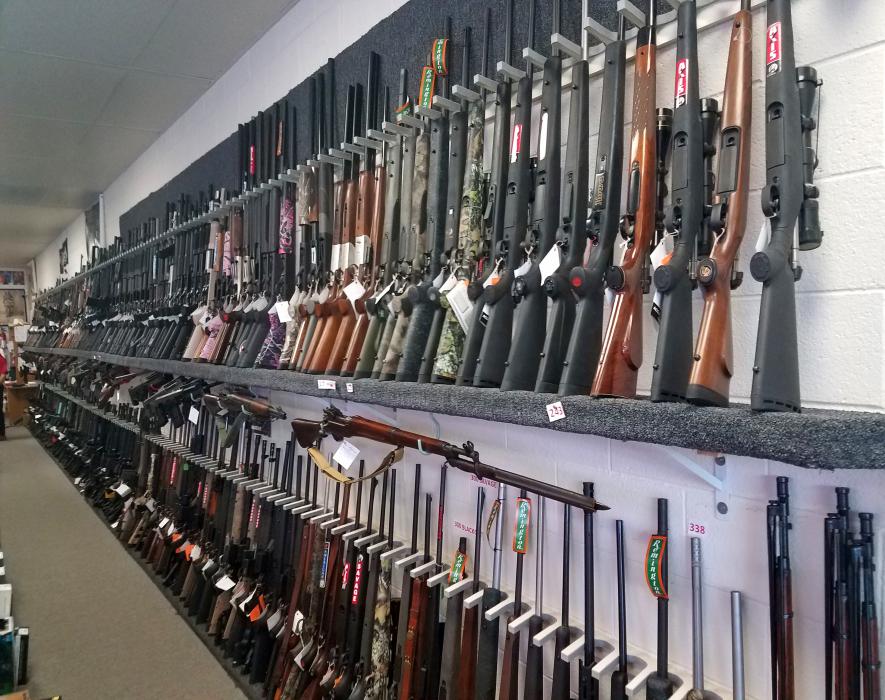 Photos by Brett Fisher. South wall of Wild Bill's Guns Too.