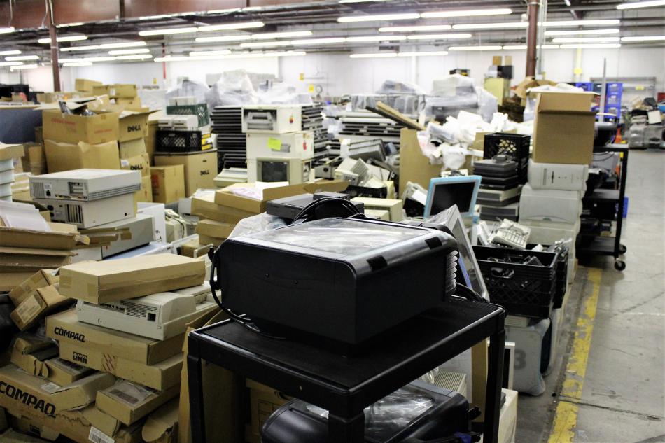ComputerCorps warehouse is stacked with various computer components.