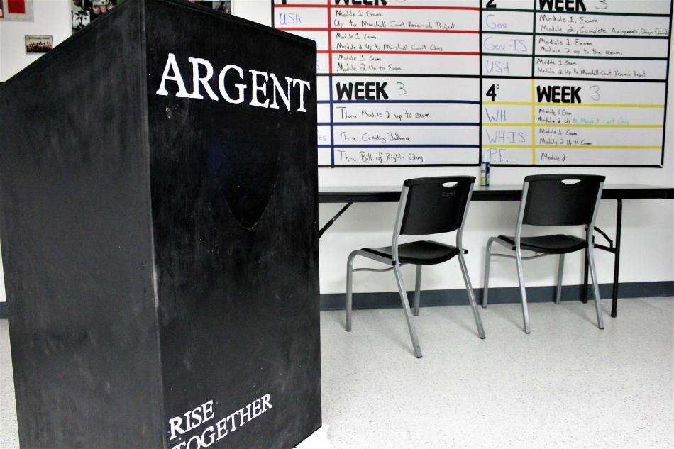 Teacher podium inside at classroom at Argent Preparatory Academy.