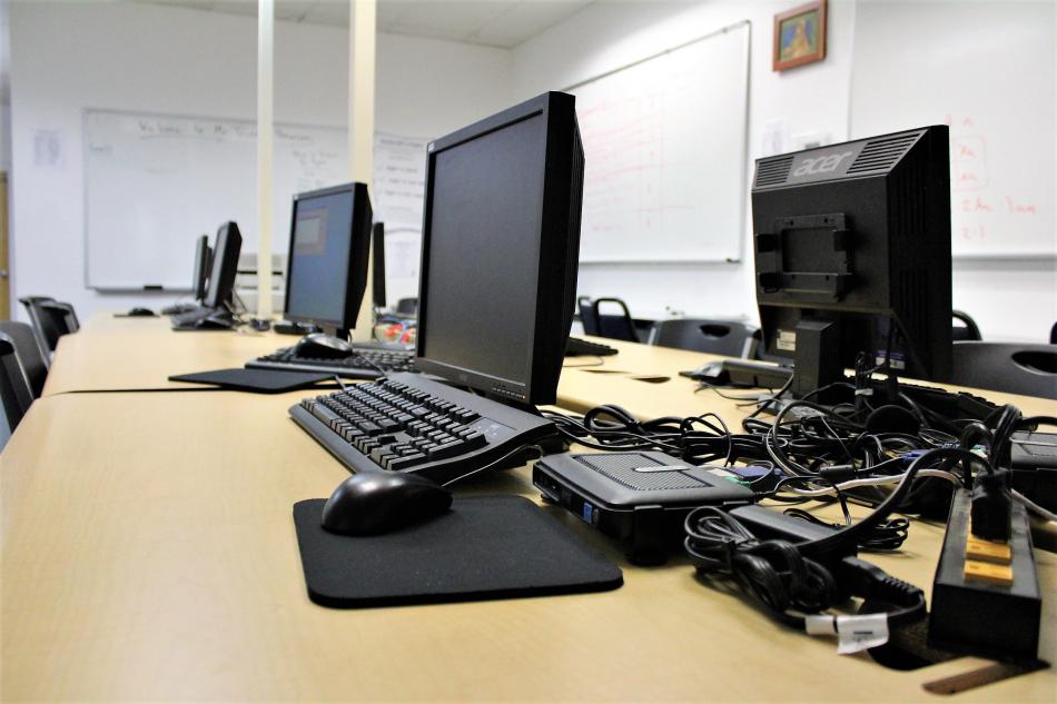 Classroom with desktop computers inside Argent Preparatory Academy.