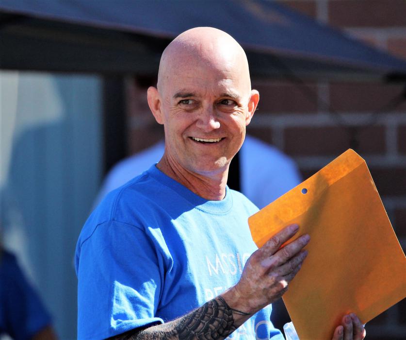 Photos by Brett Fisher. Mark Lindquist at the pub crawl fundraiser in his honor.