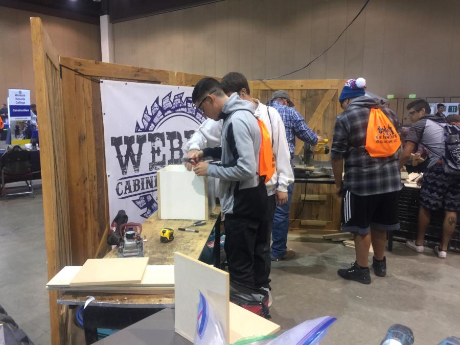 Donovan and Avery building birdhouses