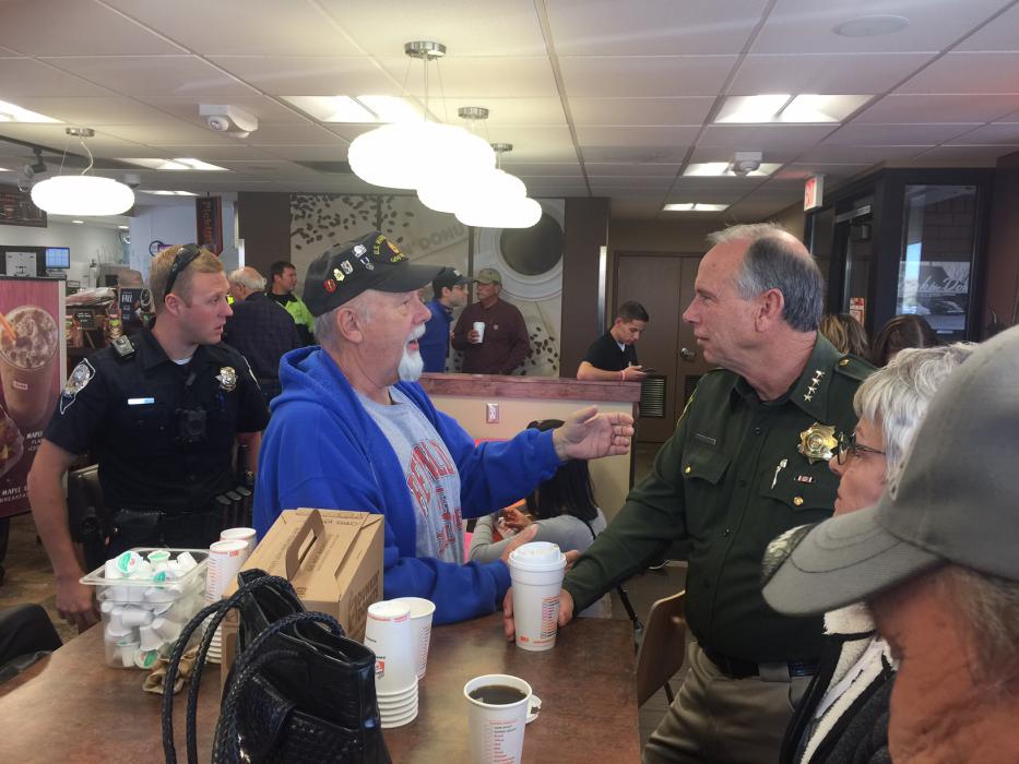 L to R: Frank Reynolds and CCSO Sheriff Ken Furlong share coffee and conversation.