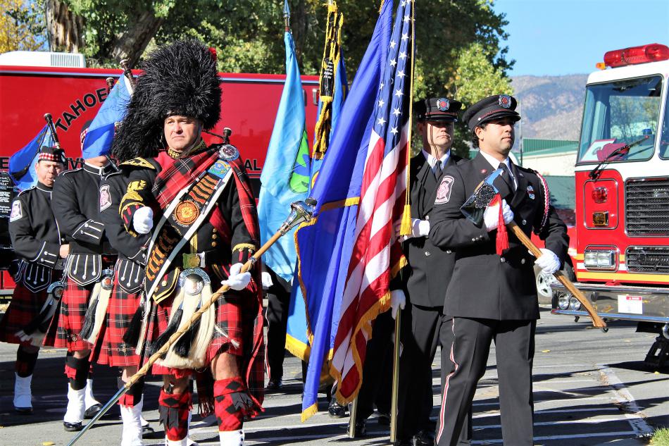Photos by Brett Fisher. Color guard along with pipe and drum corps.