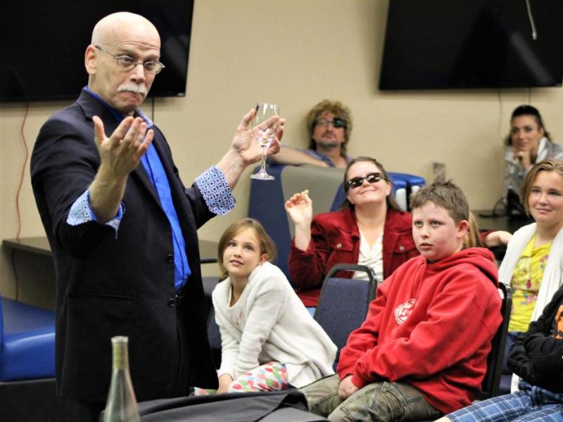 Photos by Brett Fisher. A magician leaves his audience spellbound Saturday at the Carson City Library.