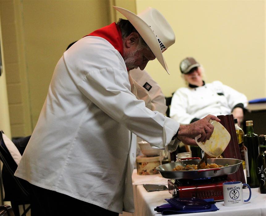 Chef Don Pepe prepares his Paella in a hot skillet infused with Portugese olive oil.