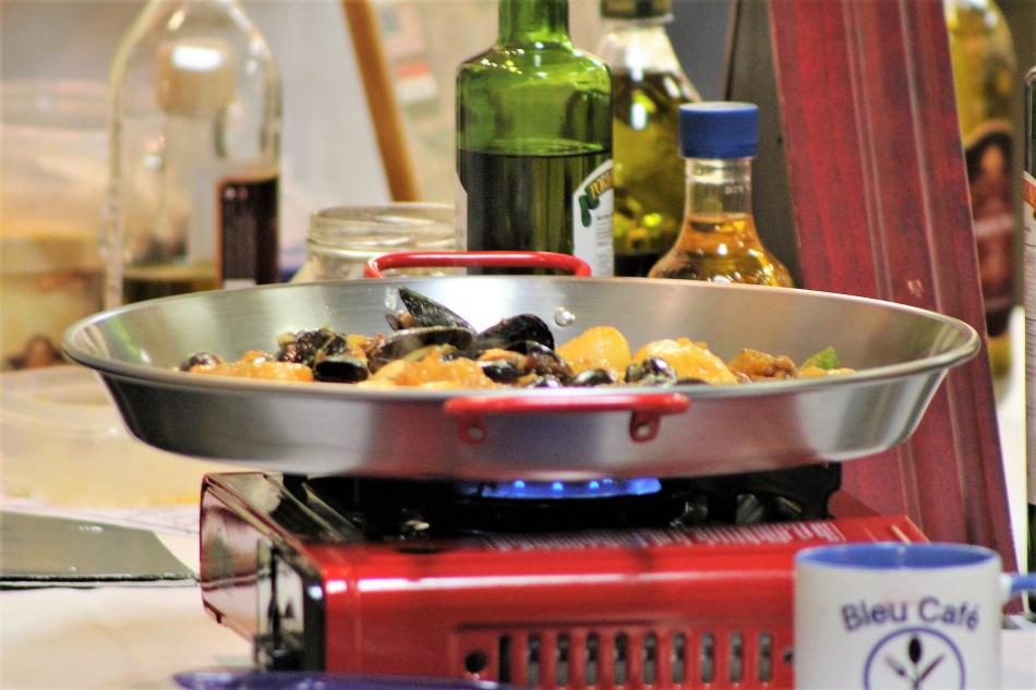 Paella cooks in fine Portugese olive oil.