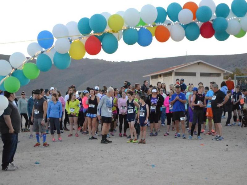 Participants gather at the Light After Dark event in 2015.