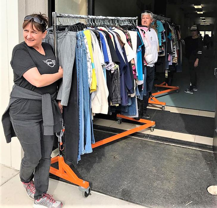 Photos courtesy NNDC. Racks of clothing are moved for distribution into the community.