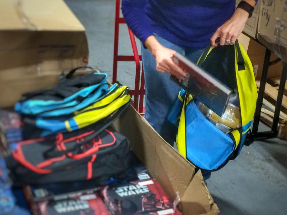 Carson City School District employees fill backpacks to send to students statewide