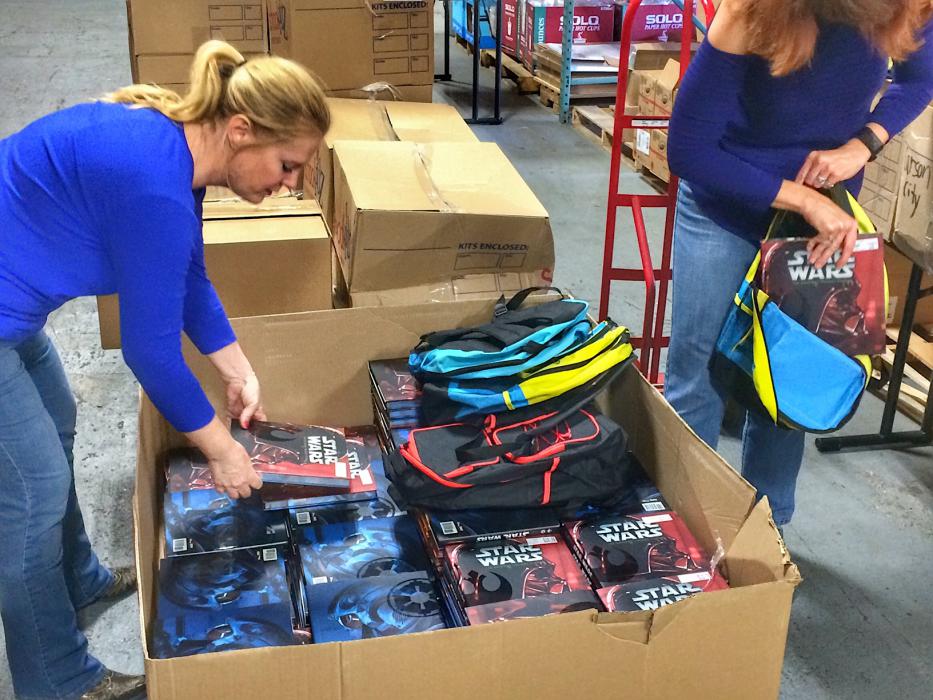 Carson City School District employees fill backpacks to send to students statewide