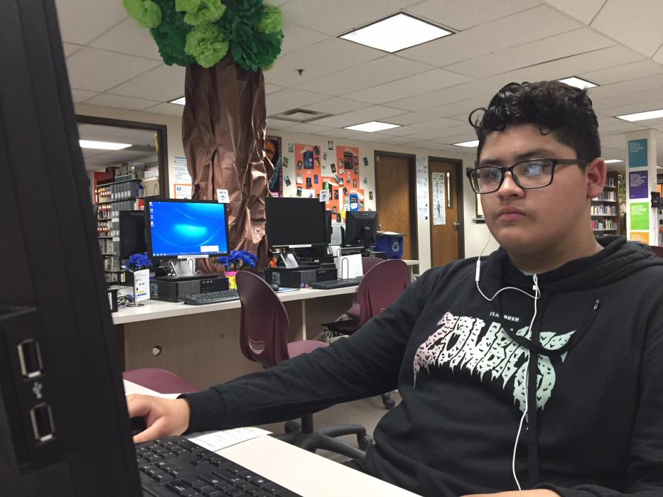 CHS student Axaell Carrillo researching the life of a composer.