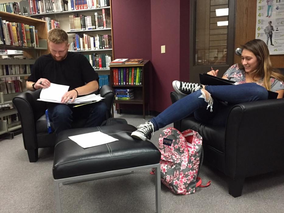 CHS students Keith Conley and Emily Harper work on their senior projects.