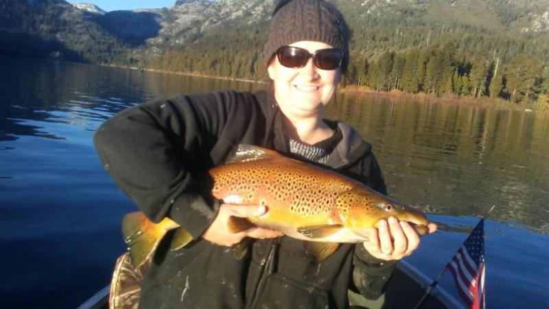 Tabitha Tripp with her catch near Emerald Bay at Lake Tahoe.