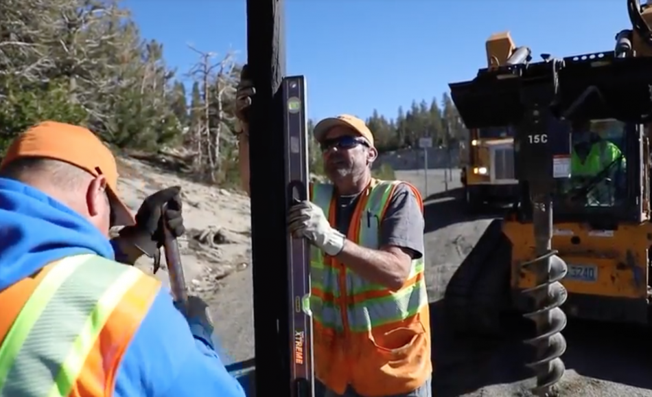NDOT crews install snow poles at Mt. Rose.