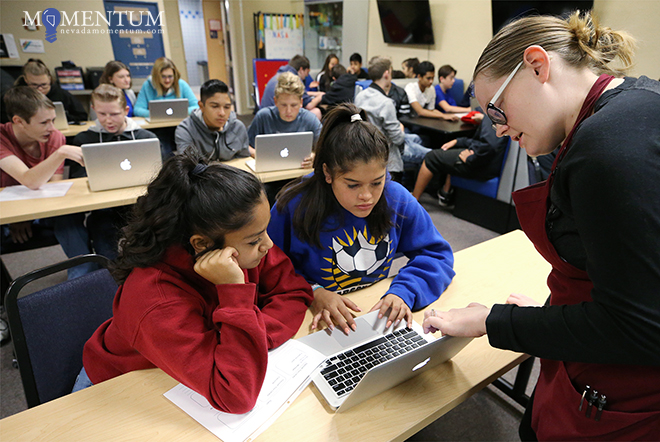 Digitorium Facilitator Kim Thomas teaches CHS freshmen how to use video editing software. Cathleen Allison, Nevada Momentum