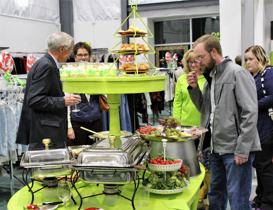 Guests enjoy hors d'oeuvres Thursday night at Classy Seconds.