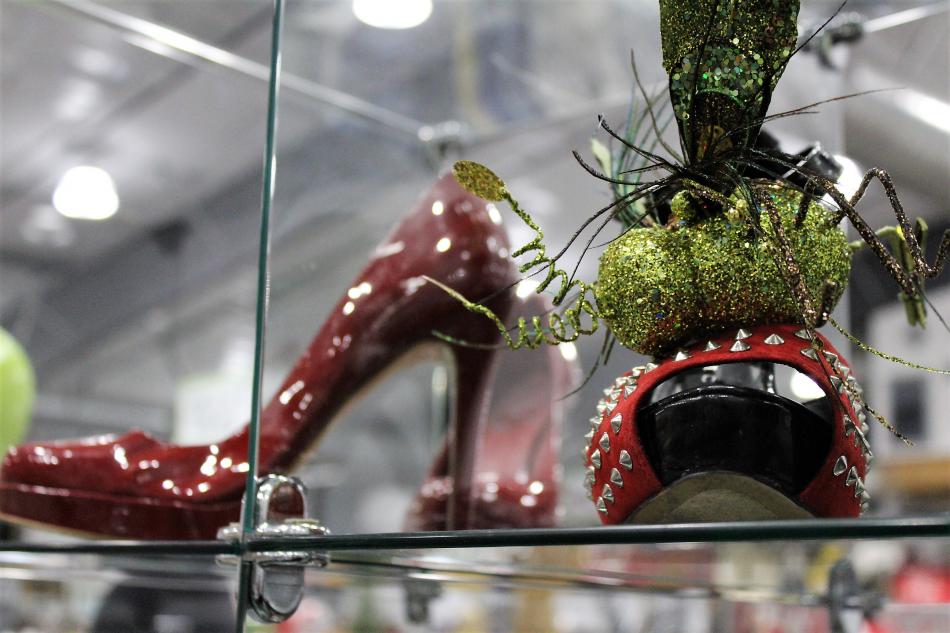 High-heeled shoes in a display case at the Boutique inside the all-new Classy Seconds.