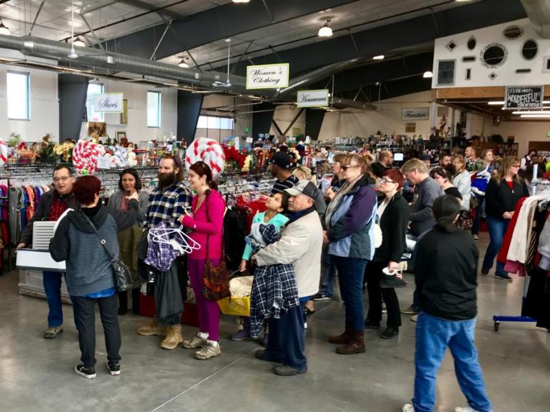 Customers line up for the register.