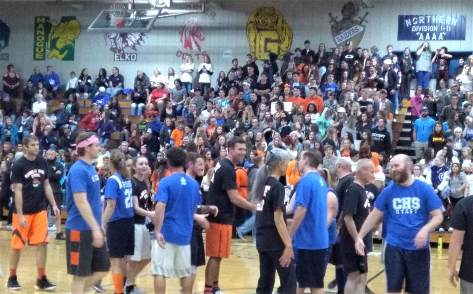 CHS shaking Douglas' players hands.